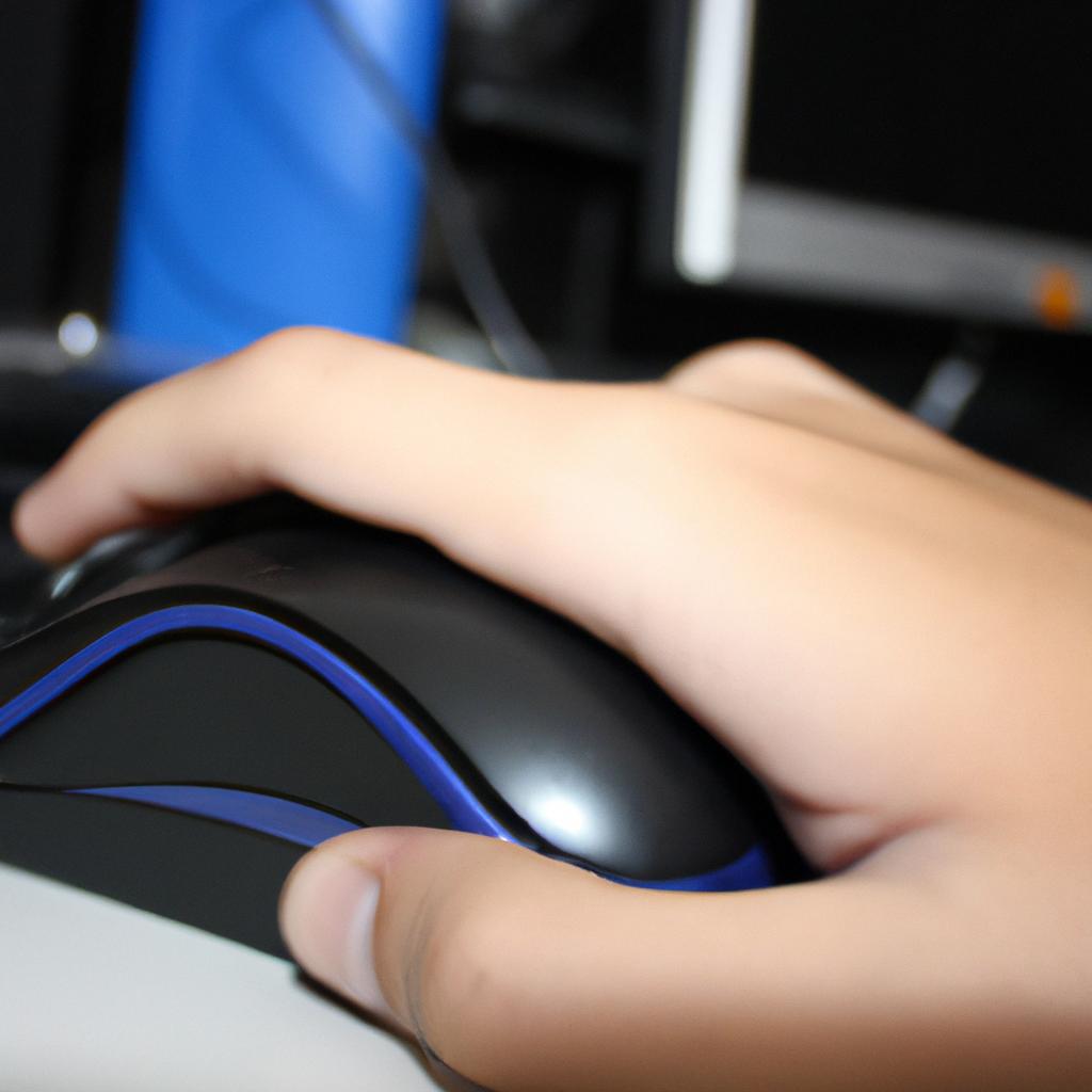 Person using a computer mouse